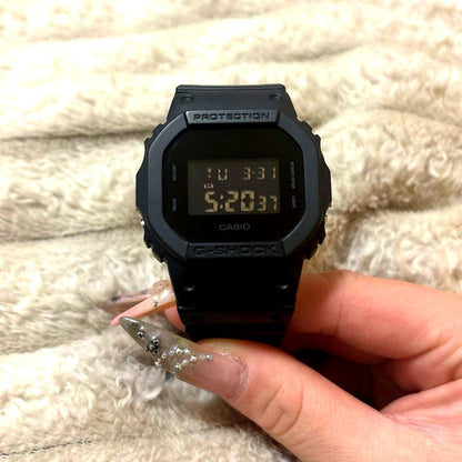 Casio G-Shock DW-5600BB-1 black digital wristwatch in clean used condition with no accessories