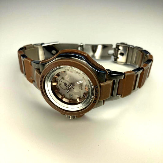 Casio Baby-G BGA-1300 women's solar watch with silver and brown stainless steel resin band
