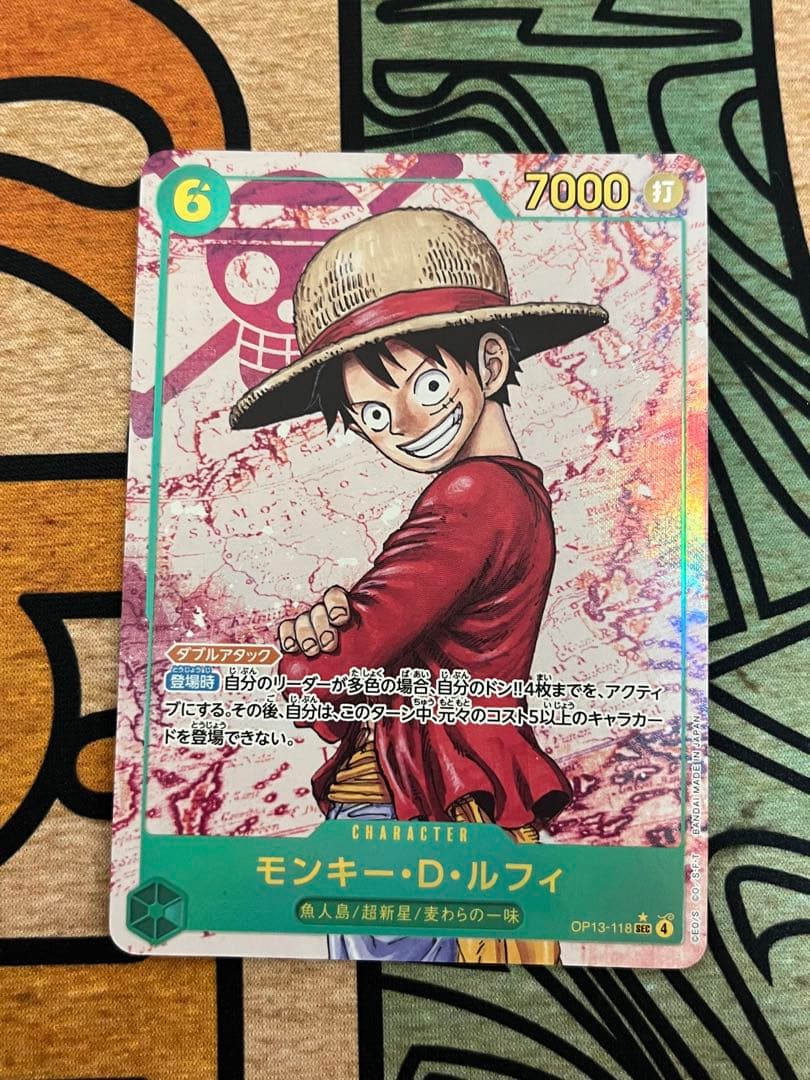 One Piece Monkey D. Luffy SEC Parallel OP13-118 trading card Japan import featuring colorful anime art