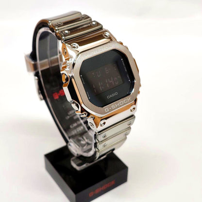 Casio G-Shock GM-5600YM-8JF digital watch with silver metal square bezel and black resin band