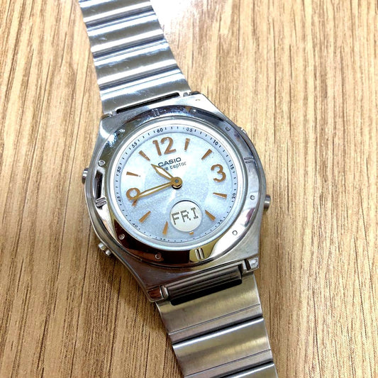 Casio Wave Ceptor LWA-M141 watch with white round dial and silver stainless steel band