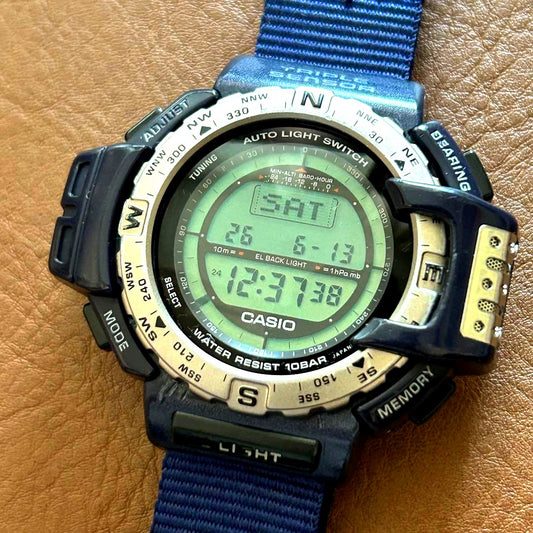 Casio Pro Trek PRT-40 navy digital watch from the 1990s with navy strap and digital display