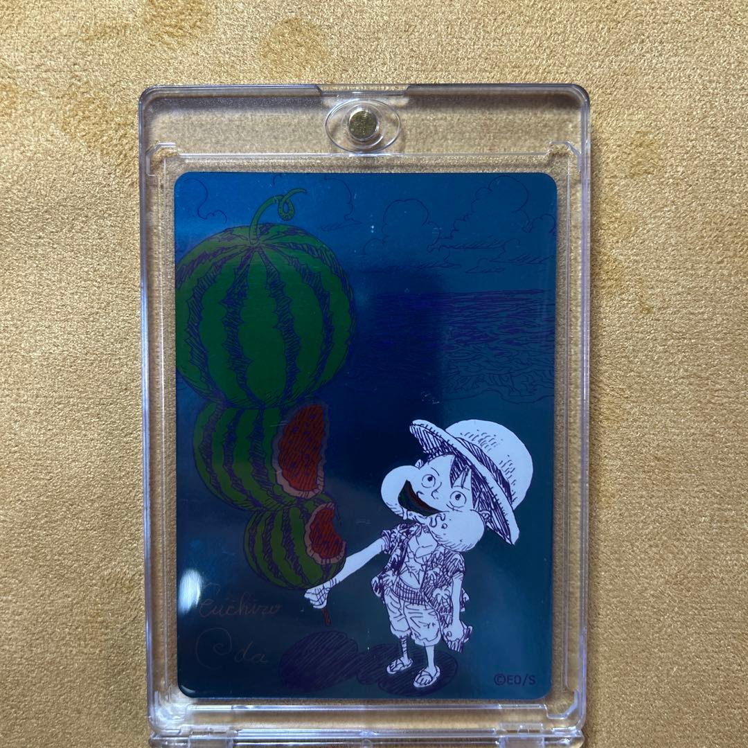 Oda Eiichiro signed One Piece Natsumi 2026 Metakira trading card in protective hard loader from Japan