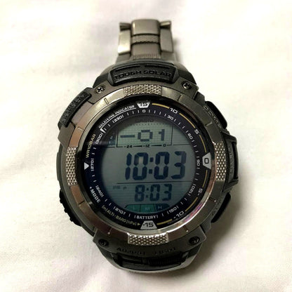 Casio Pro Trek PRW-1000TJ solar-powered wristwatch with black strap showing some wear