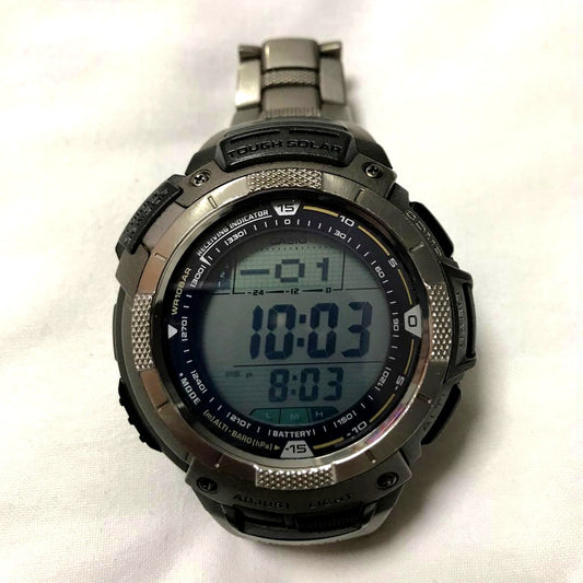 Casio Pro Trek PRW-1000TJ solar-powered wristwatch with black strap showing some wear