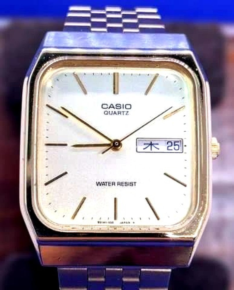 Casio MQ-518 men's quartz watch with rectangular case and Japanese day date display