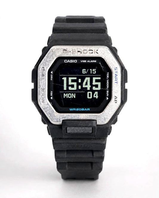 Casio G-Shock G-Lide GBX-100 Bluetooth digital watch with MIP LCD screen showing time and date