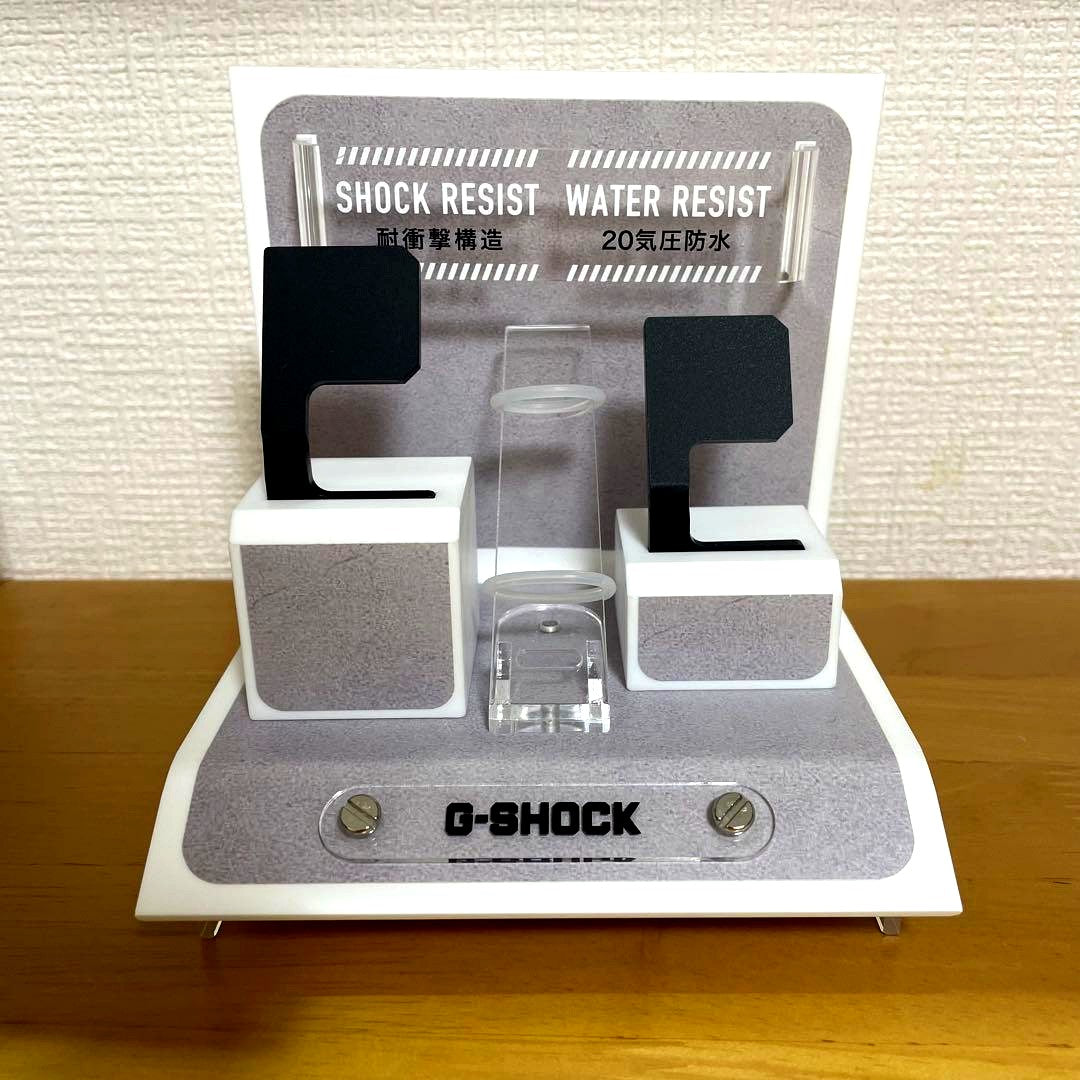 Brand new Casio G-SHOCK ring watch with genuine stand in unused condition