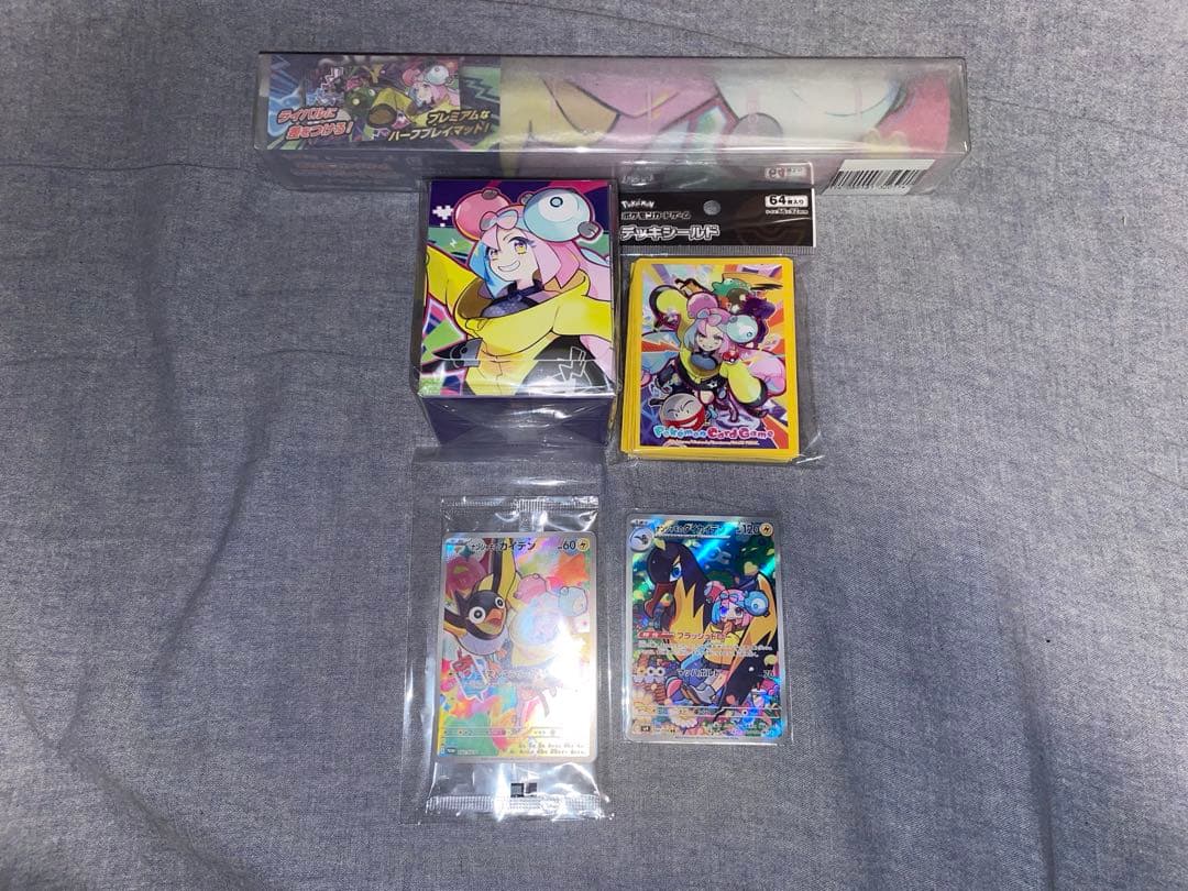 Bandai Nanjamo Battle Partners promo set with playmat, card sleeve, deck case, and unopened Nanjamo's Kaidan promo card