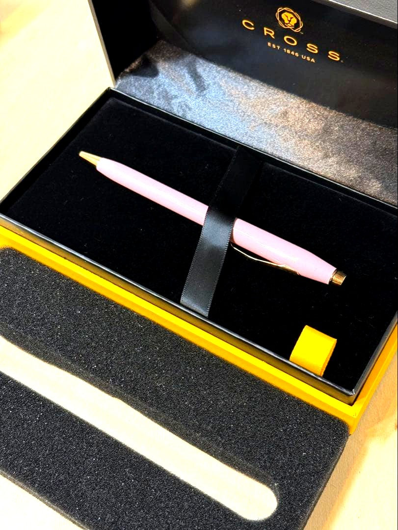Used Cross Century 2 pen in smoky pink with medium oil-based ink, like new condition