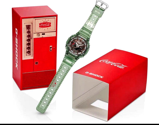 Casio G-Shock Coca-Cola Edition GA-2100CC-3AJR green watch with Coca-Cola bottle motifs and special collaboration packaging