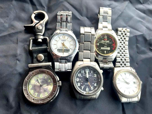 Set of five used Casio watches from Japan displayed together as a collection