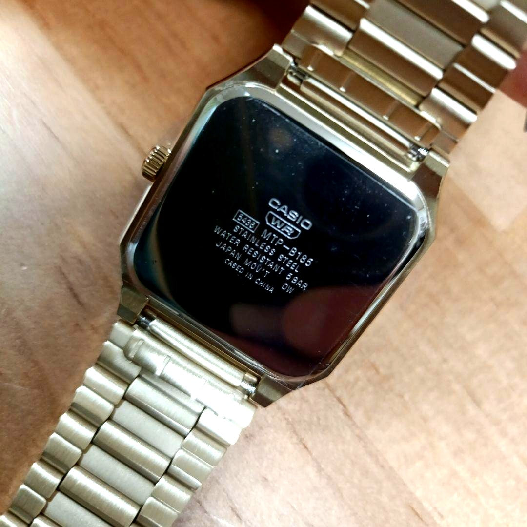 Casio MTP-B185G-9AV square case stainless steel analog watch with date display