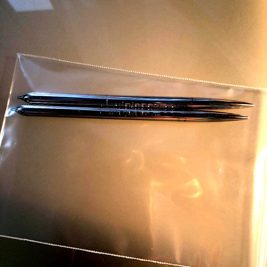 Two silver-plated ballpoint pens with engraved branding from UIP Movie Lineup Limited Edition set