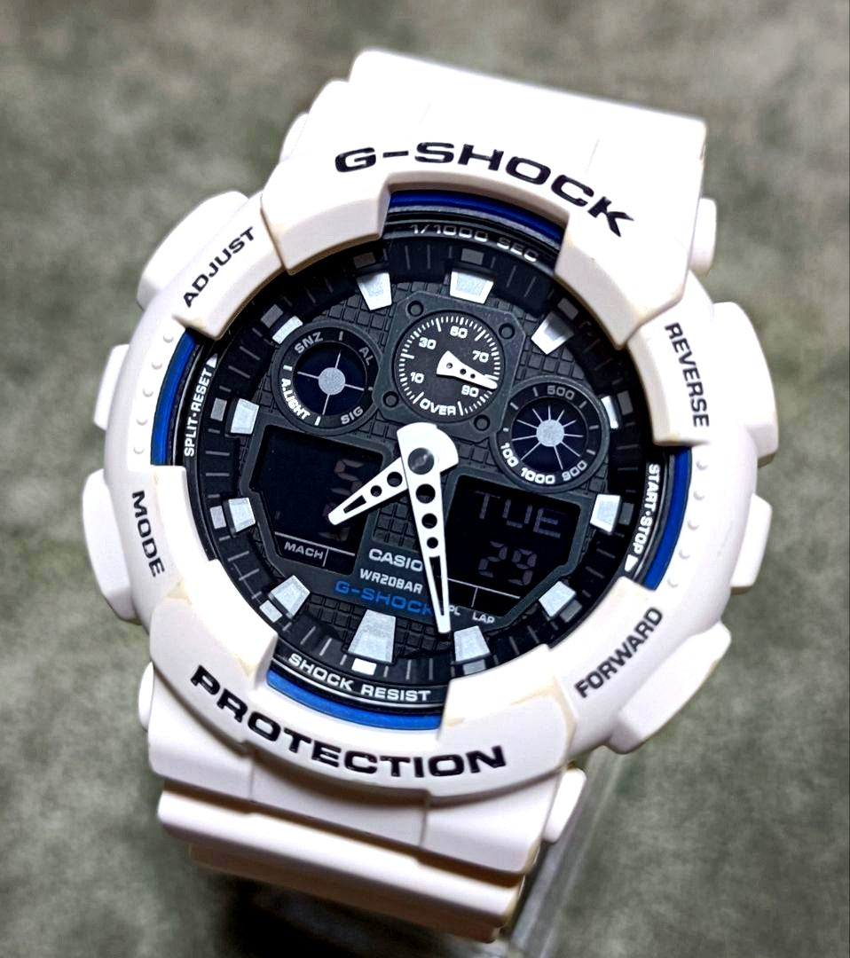 Casio G-Shock GA-100B white digital and analog watch with scratch-free glass and white strap