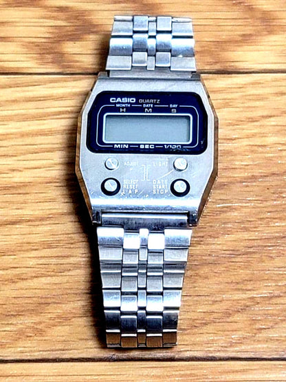 Casio 52QS-14 retro watch in used condition showing front display and strap