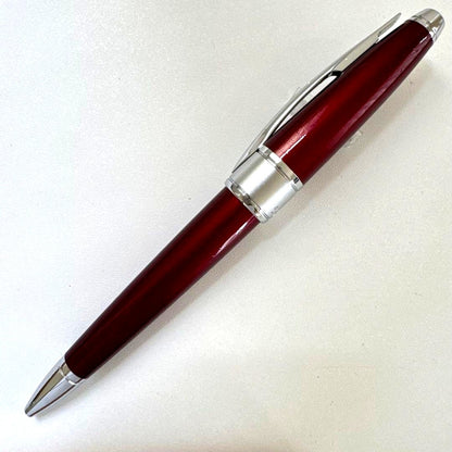 Cross Apogee red ballpoint pen with twist mechanism, Japan import, showing minor signs of use