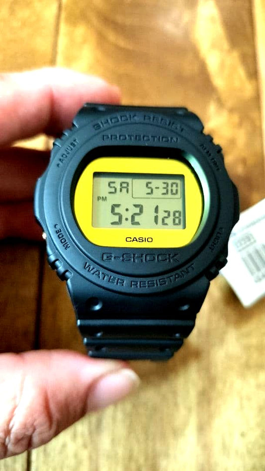 Casio G-Shock DW-5700BBMB shock resistant watch with blue-green backlight and resin band