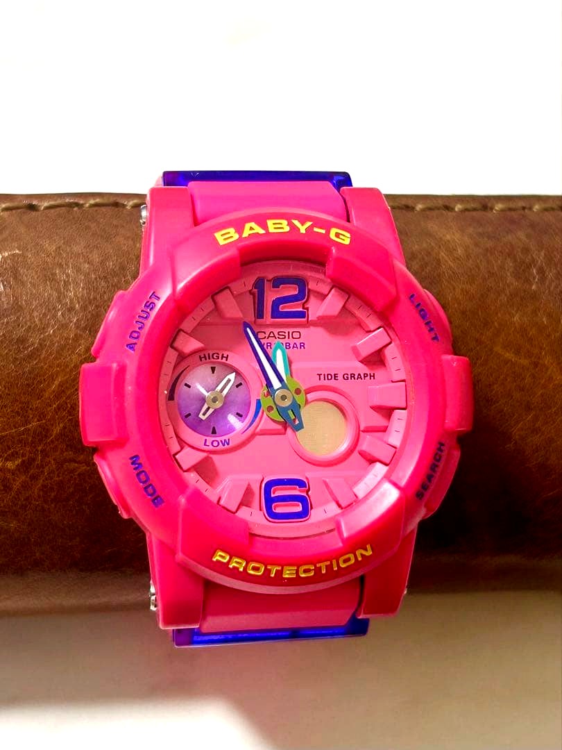 Casio Baby-G pink digital watch showing signs of use with original battery