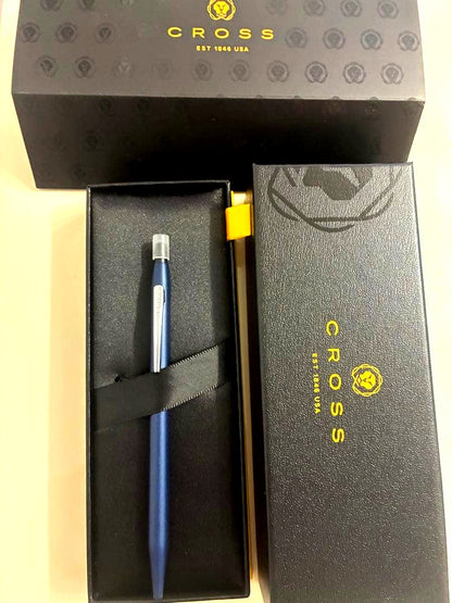 Cross blue ballpoint pen with matte finish and silver clip displayed with special case