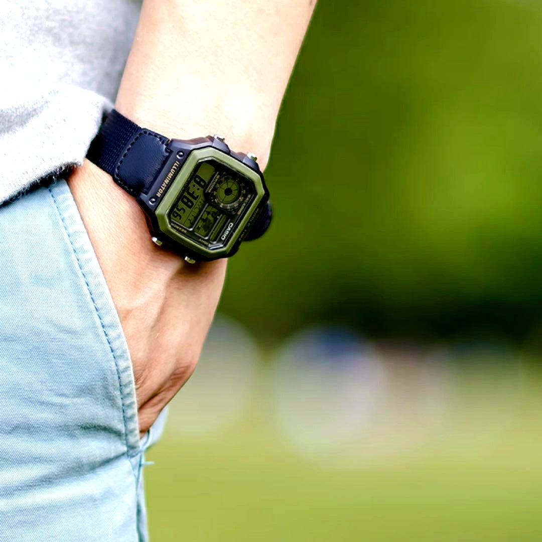 Casio AE-1200WHB-1BVDF digital watch with world map display and black nylon band