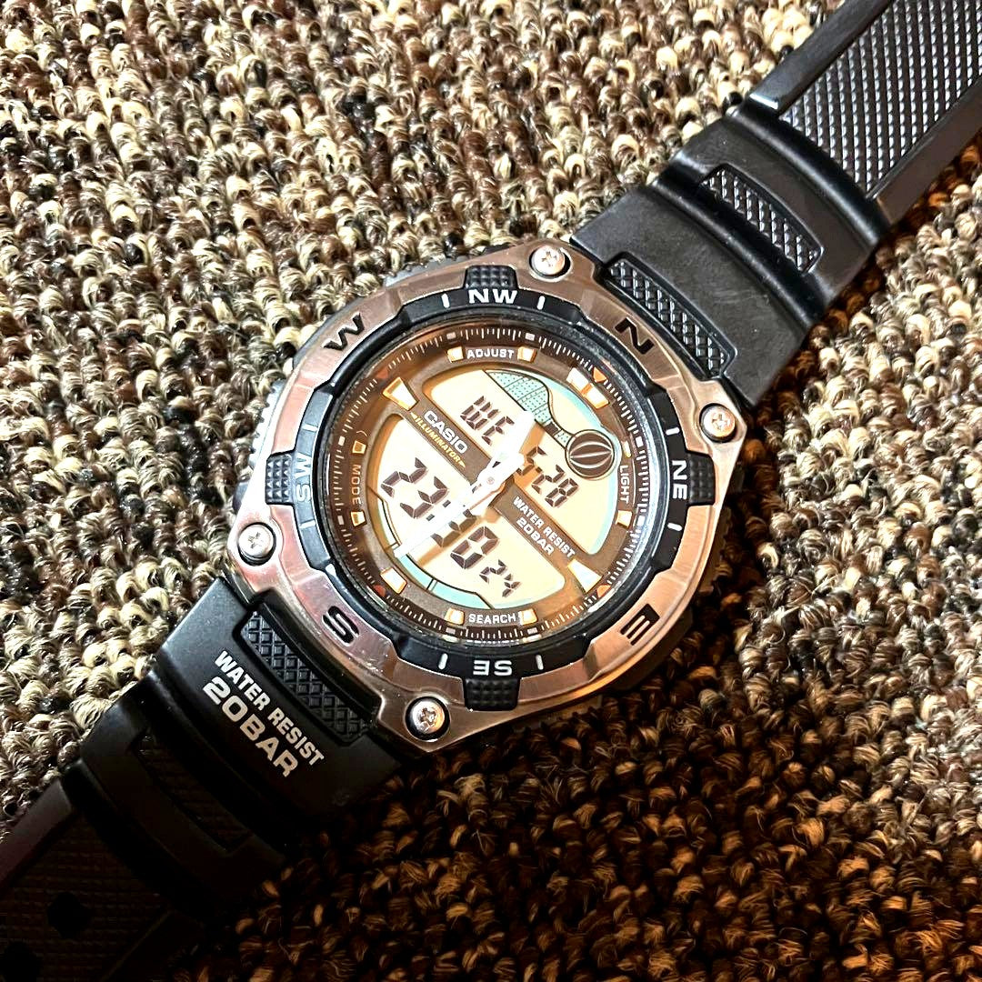 Secondhand Casio Analogue-Digital AQW-100 quartz watch with original polyurethane belt and minor scratches