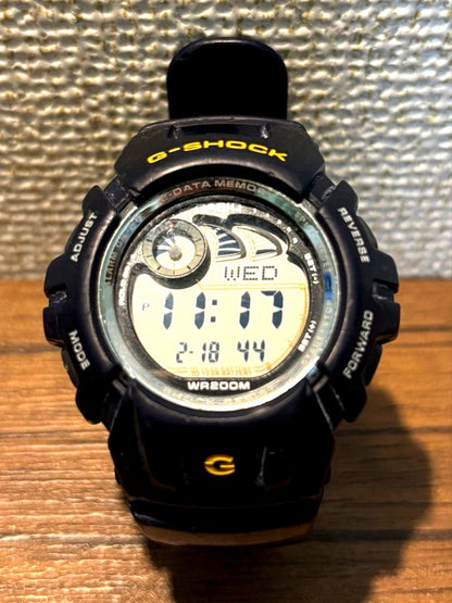 Casio G-SHOCK G-2900 digital watch in navy color showing the digital display and resin strap