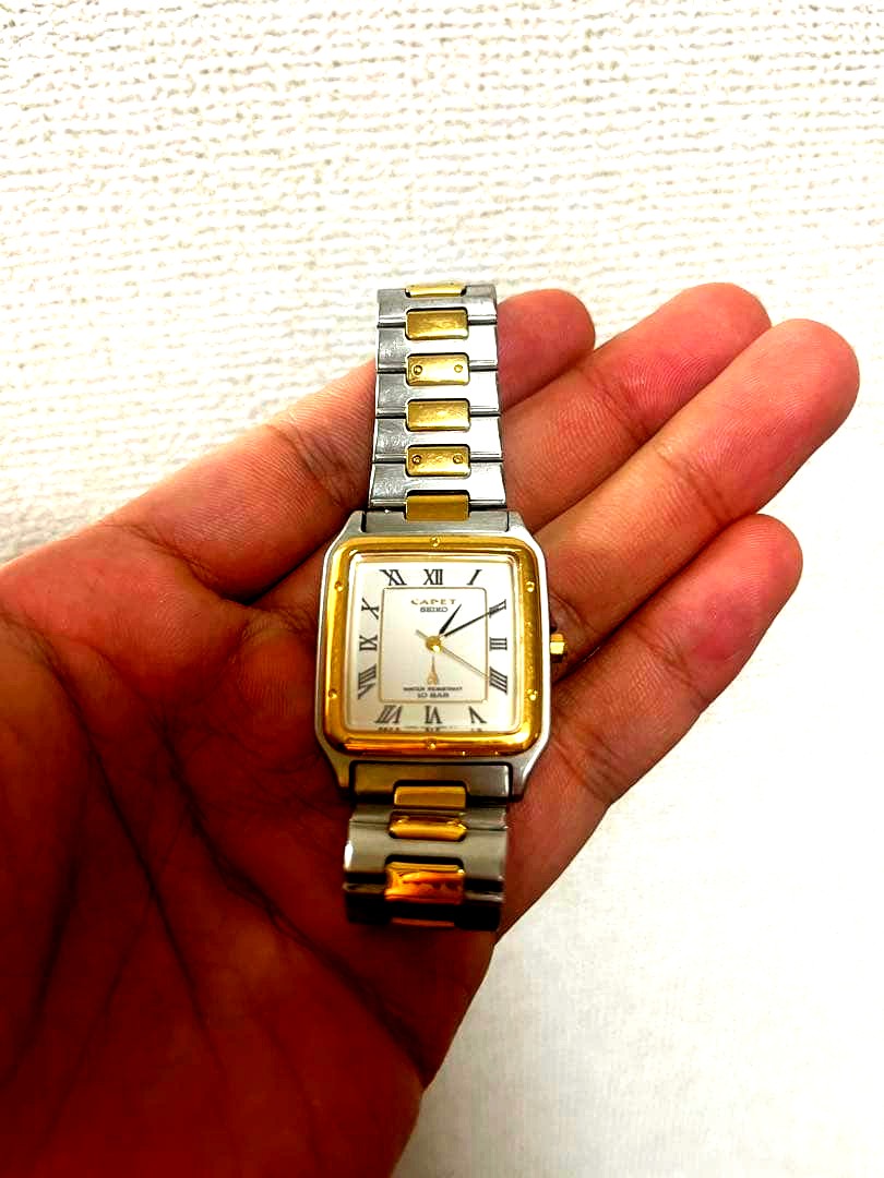 Casio analog wristwatch in silver and gold with silver and gold band, Japan import