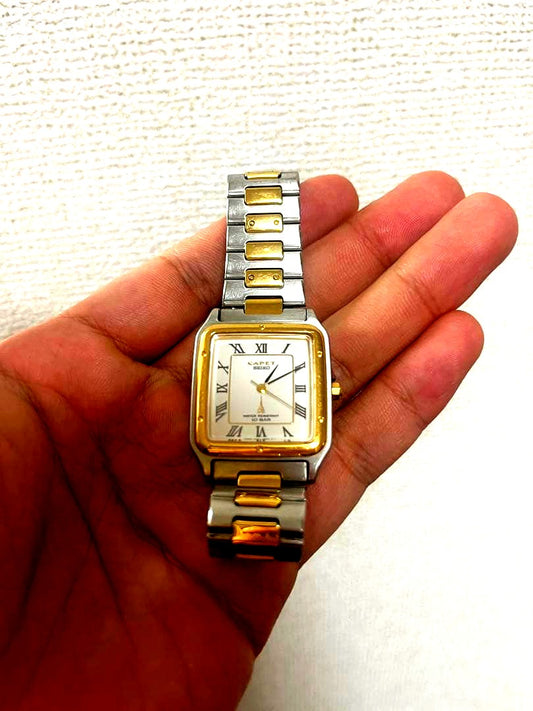 Casio analog wristwatch in silver and gold with silver and gold band, Japan import