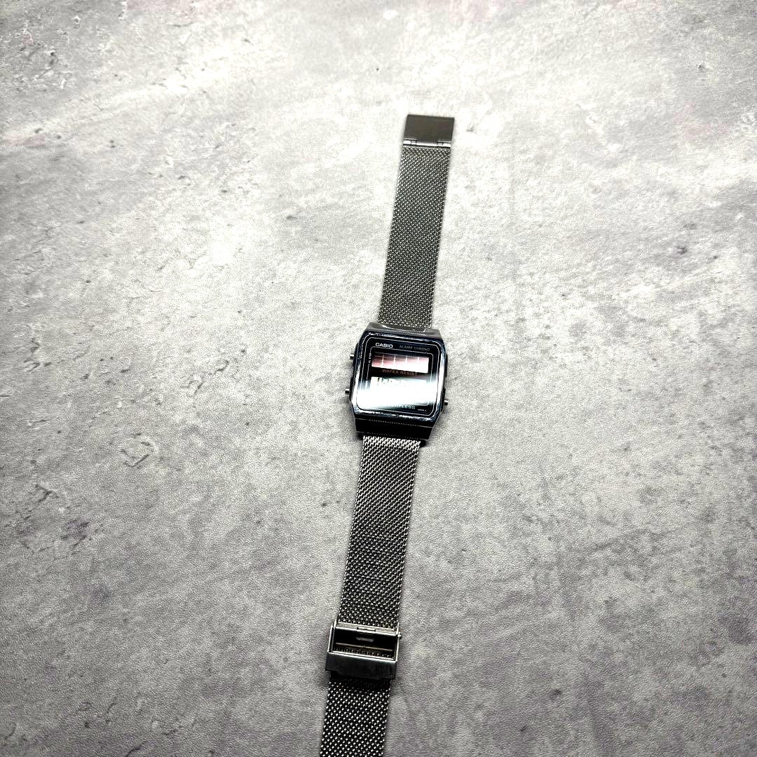 Casio AL-180 solar-powered analog watch Japan import with visible wear and good condition