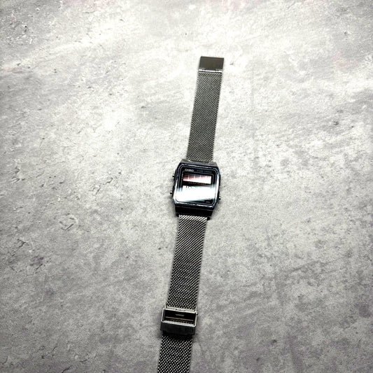 Casio AL-180 solar-powered analog watch Japan import with visible wear and good condition