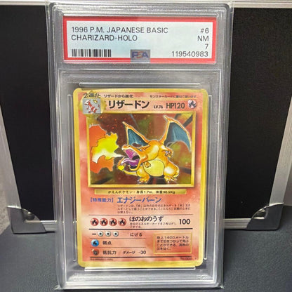 Pokemon PSA7 Charizard Flame Lizardon card from 1996 First Expansion Pack graded PSA7