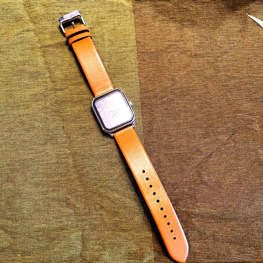 Casio MTP-M305L-1A rectangle watch with black dial, gold hands, and brown leather strap