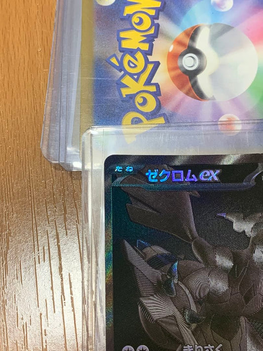 Pokemon Card Zekrom EX 174/086 BWR shown in protective packaging against damage and water