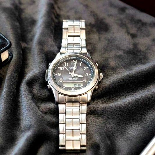 Casio Lineage LCW-100 full metal Tough Solar wristwatch with silver case and black dial