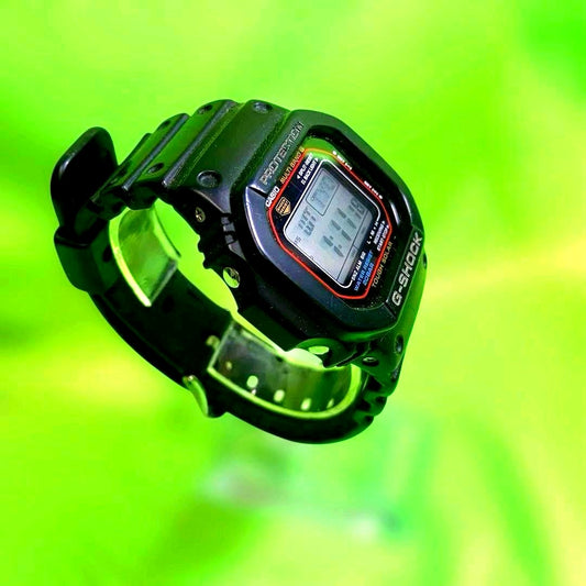Casio G-SHOCK GW-M5610 digital watch showing time and date with black resin band