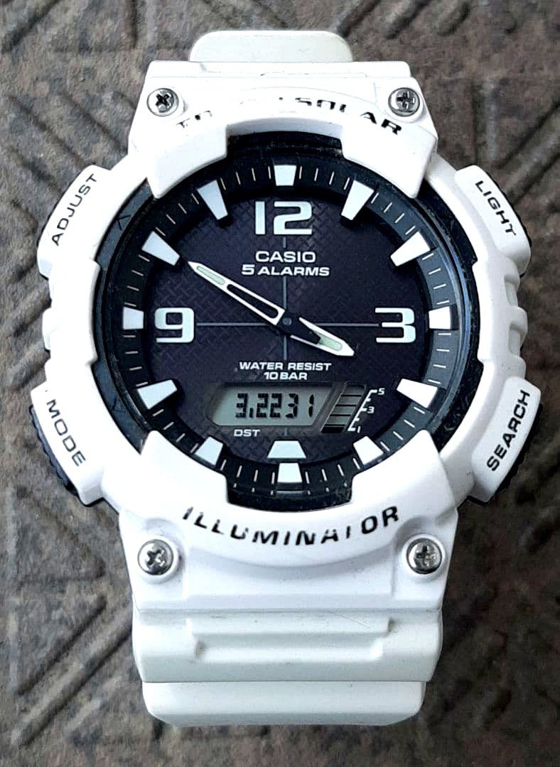 Casio AQ-S810W white digital watch with 10 ATM water resistance and 5 alarms