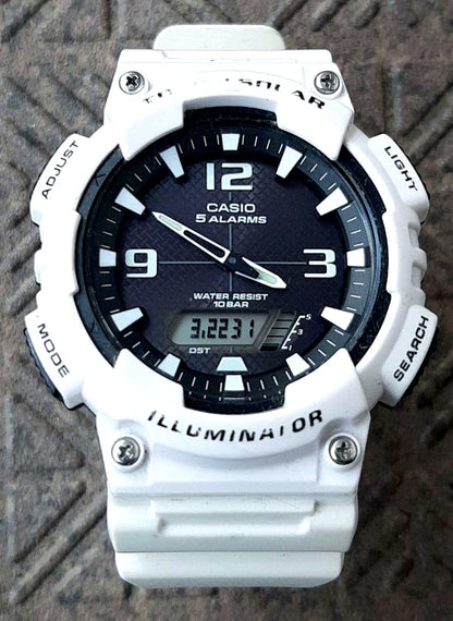 Casio AQ-S810W white digital watch with 10 ATM water resistance and 5 alarms