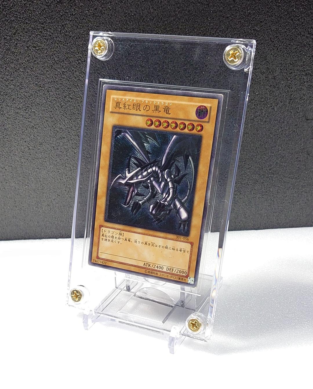 Ultimate Rare Red-Eyes Black Dragon Yu-Gi-Oh card 301-056 in screw-down case with stand, Japan import