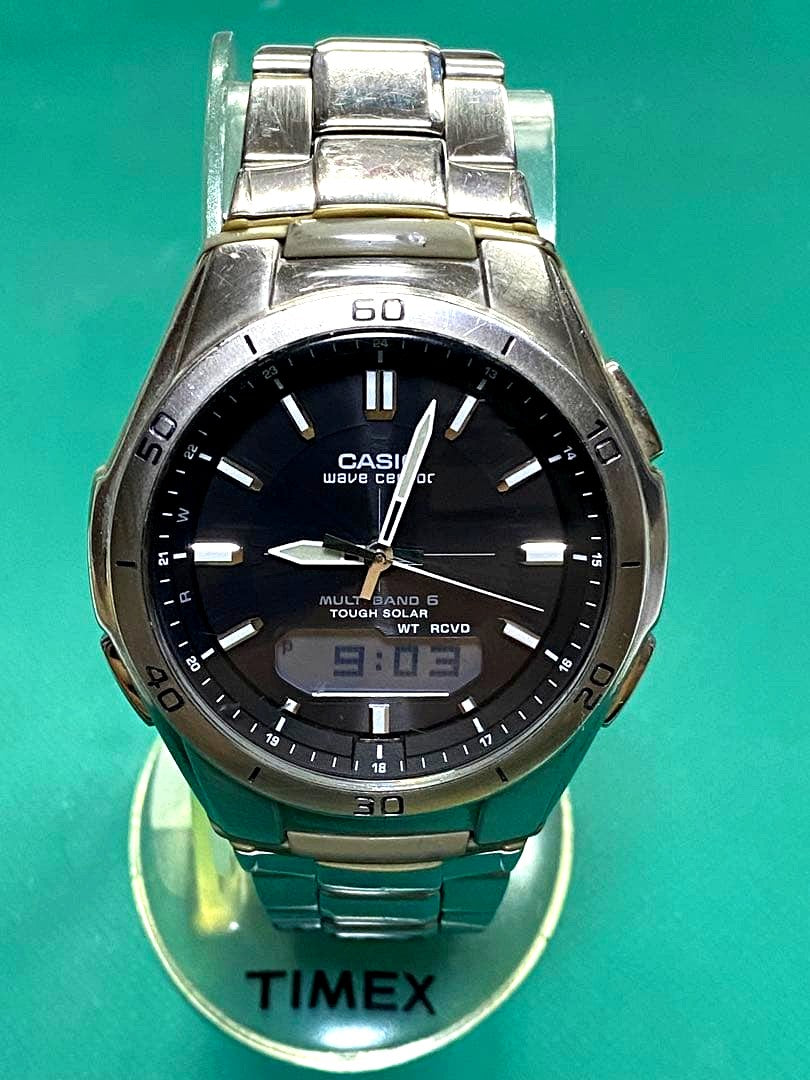 Casio Tough Solar Wave Ceptor WVA-M640 radio-controlled watch with digital display and solar power, silver band