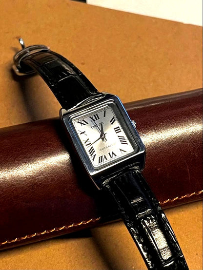 Casio square quartz watch with square case, Roman numeral dial, and brown leather band, Japan import