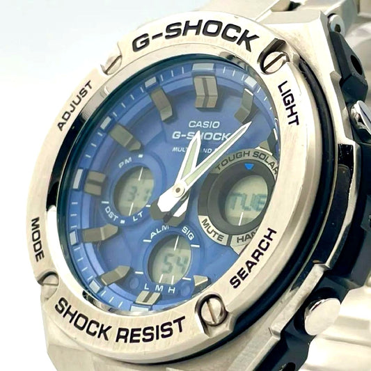 Casio G-Shock GST-W110D-2AJF blue watch with stainless steel band, clear face, and digital-analog display