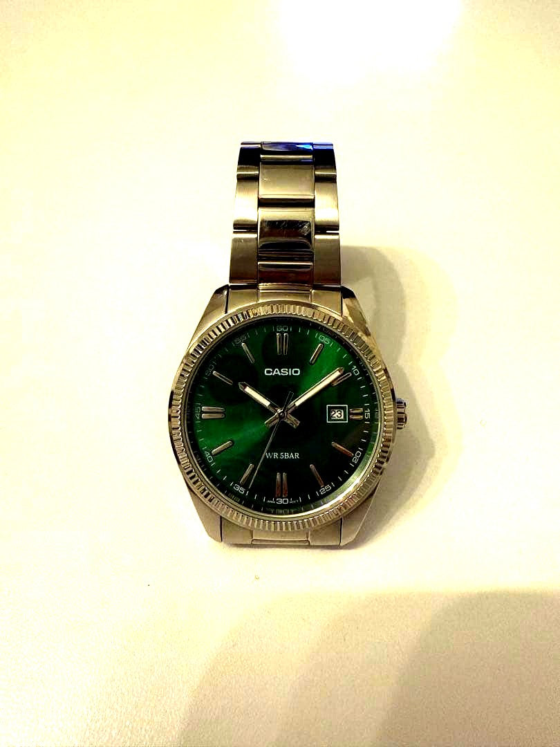 Casio MTP-1302D wristwatch with green dial in excellent condition Japan import