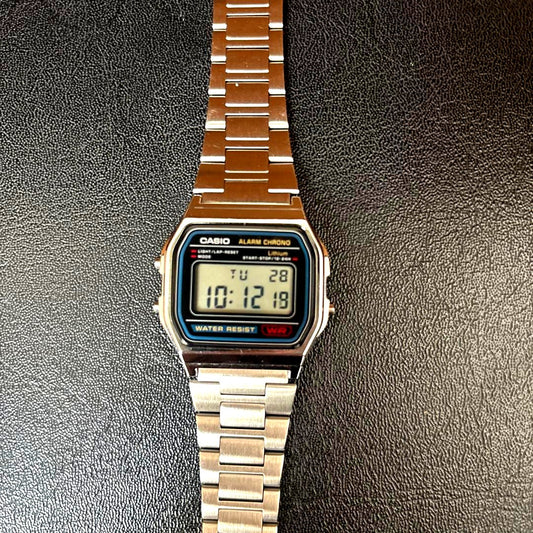 Casio A190W digital wristwatch in used condition showing classic display and metal band