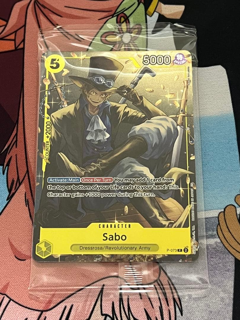 One Piece Card Game Sabo English version overseas exclusive promo card with visible initial scratches