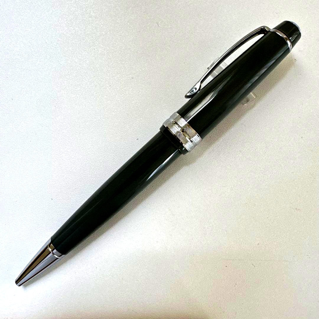 Used Cross Bailey gray twist retractable ballpoint pen imported from Japan with signs of age