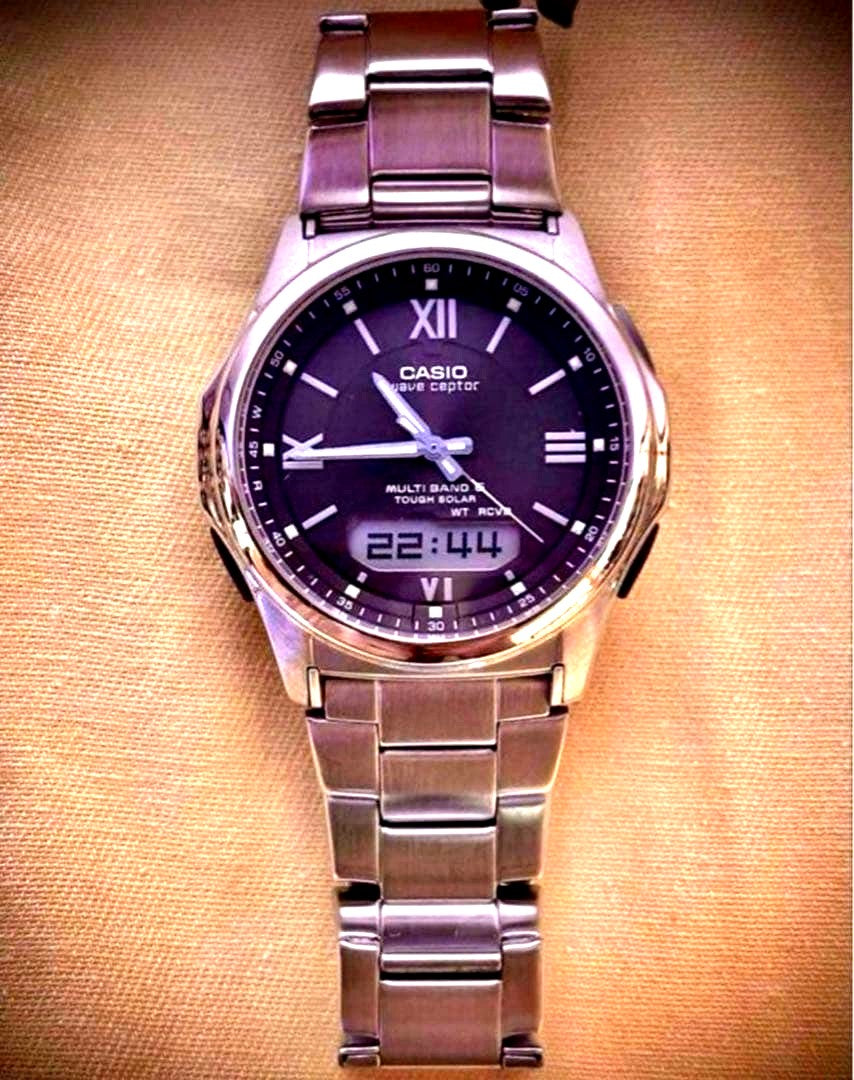 Casio Wave Ceptor men's watch Model M630 with dark brown dial and stainless steel band