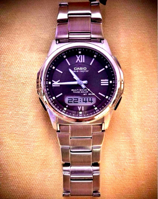 Casio Wave Ceptor men's watch Model M630 with dark brown dial and stainless steel band