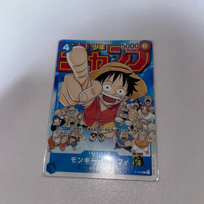 Monkey D. Luffy One Piece OP-033 card from Weekly Shonen Jump showing front with some minor red stains