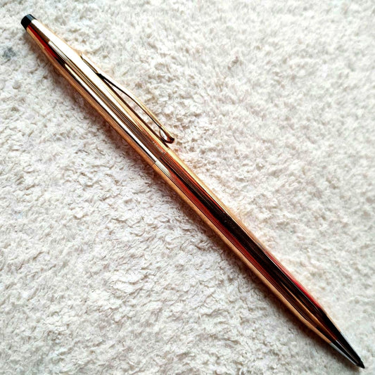Cross Classic Century 14KT gold-filled twist ballpoint pen with alloy body and gold-colored clip